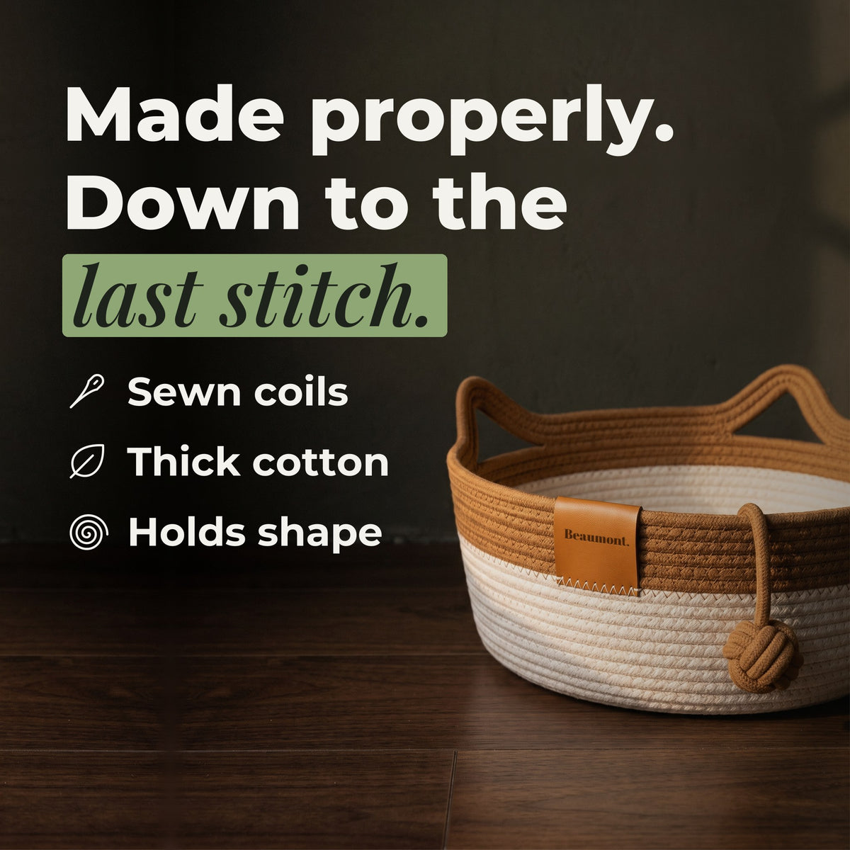 The woven rope basket close up: thick cotton rope, sewn coils and a stitched leather tag — made properly, down to the last stitch